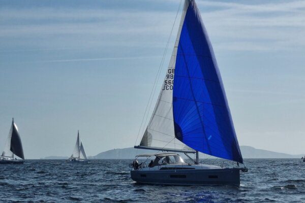 Yacht under spinnaker on Ancasta Yacht Club Rally to Cherbourg 2023